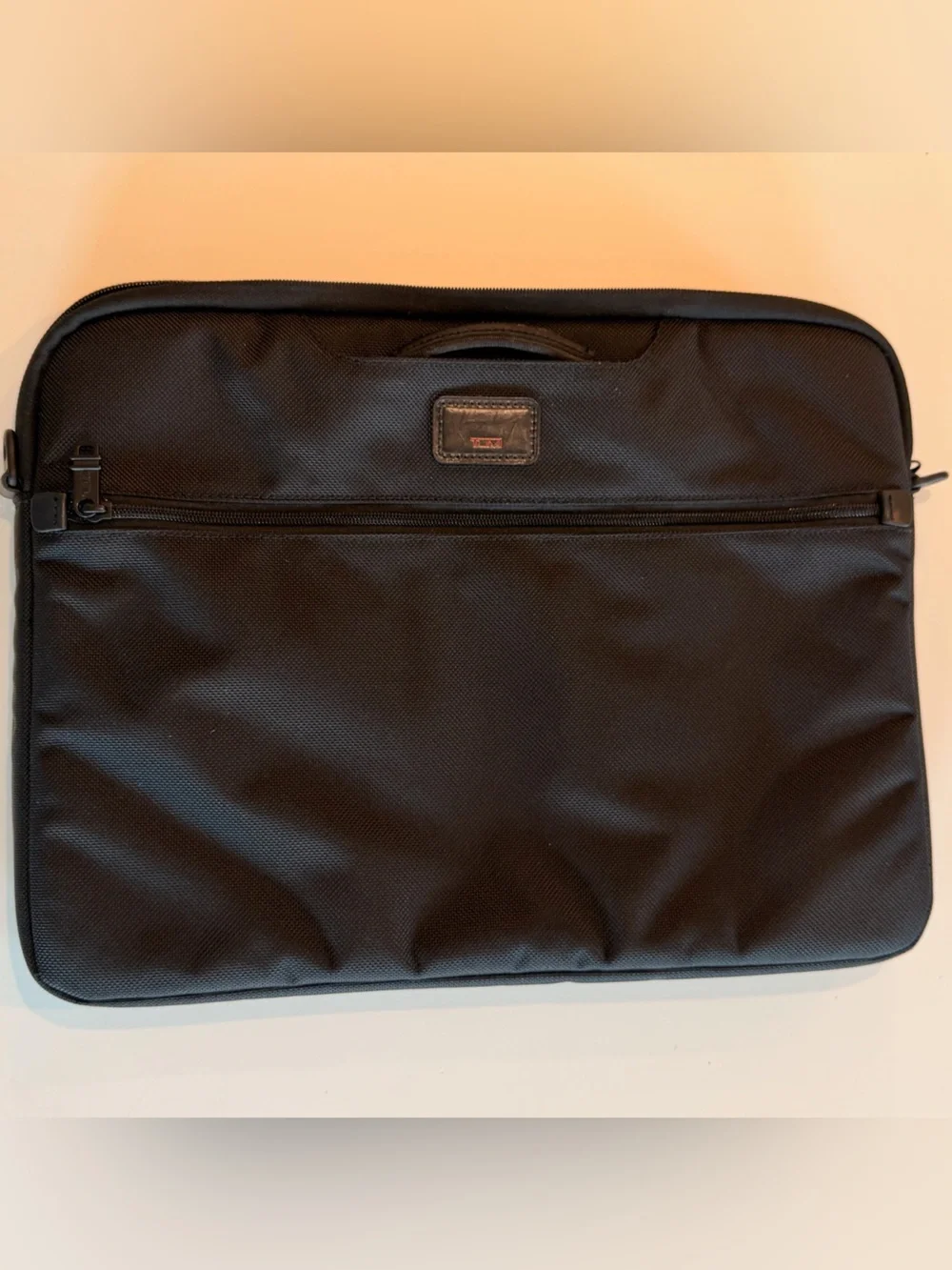 Tumi Black Travel Organizer with Red Logo